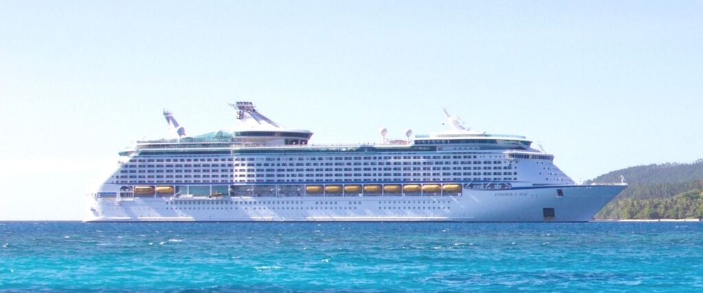 Photo of a cruise ship on a tropical sea.
